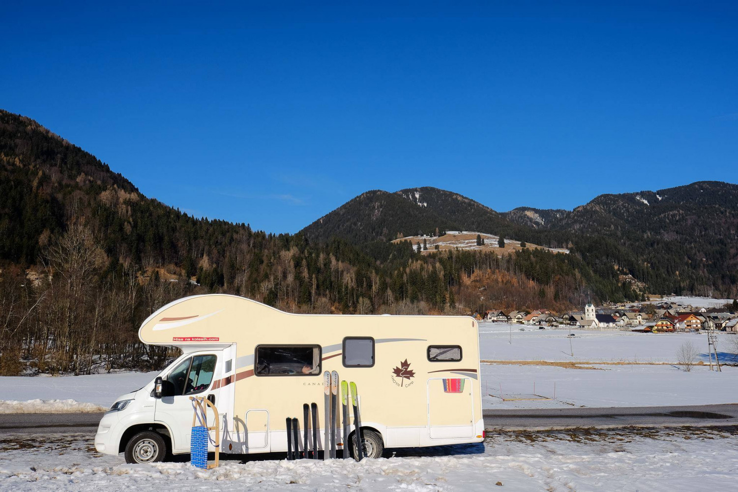 Camping in the winter season by the ski slope.